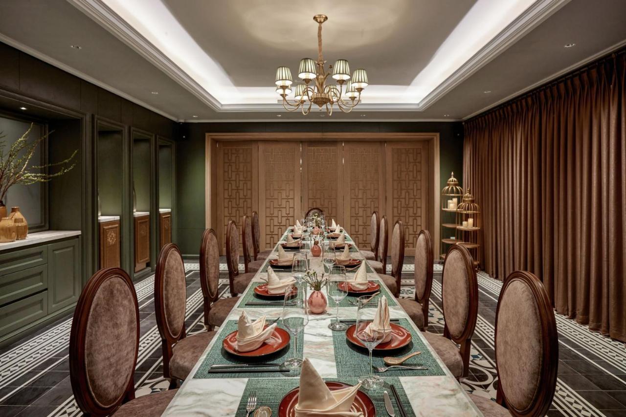 橄榄石豪华精品大酒店 河内 外观 照片 The dining room