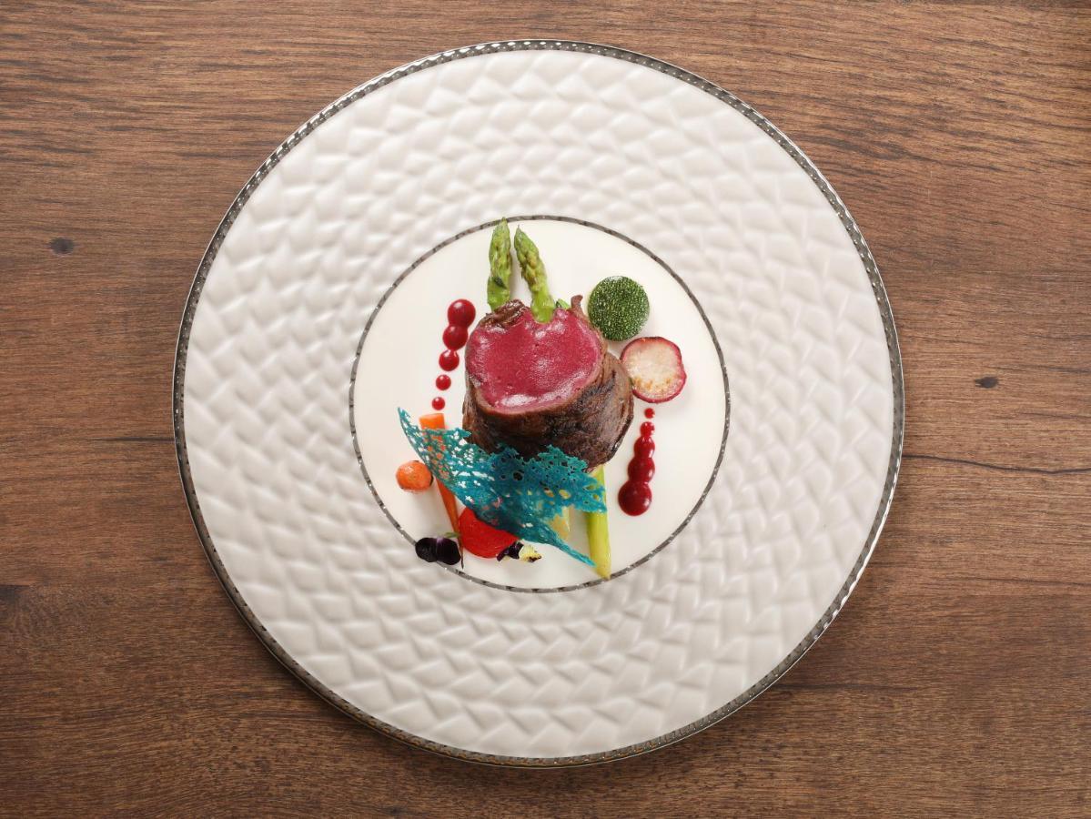 橄榄石豪华精品大酒店 河内 外观 照片 A plate of food