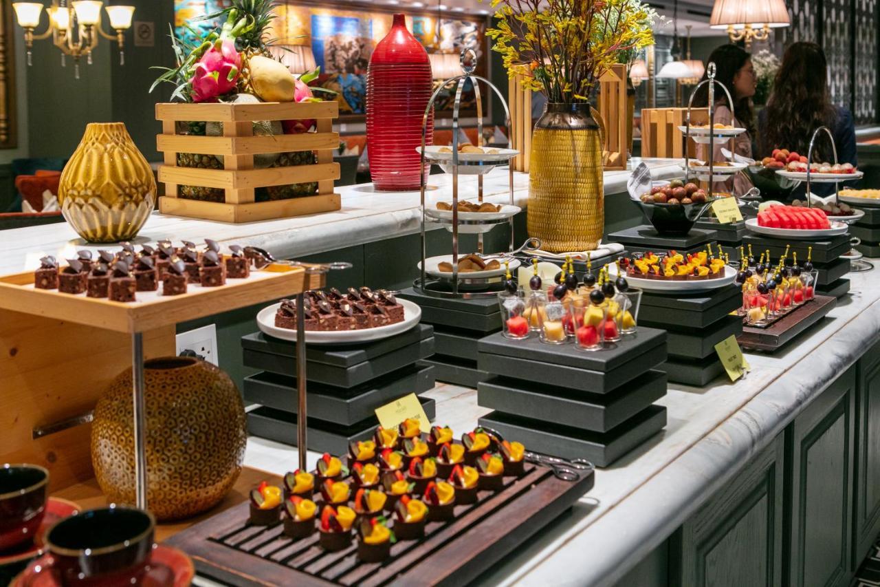 橄榄石豪华精品大酒店 河内 外观 照片 A dessert buffet