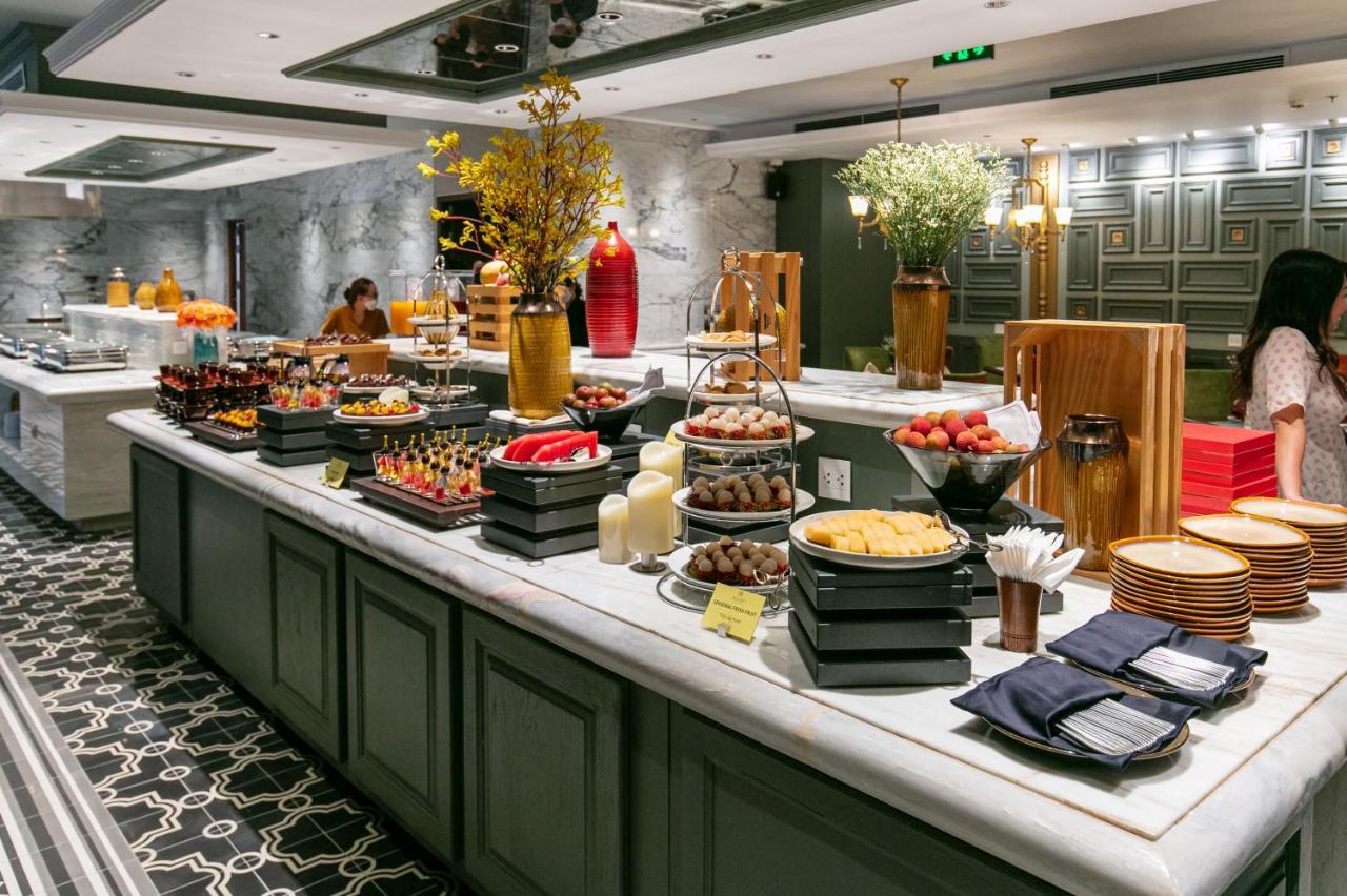橄榄石豪华精品大酒店 河内 外观 照片 A dessert buffet